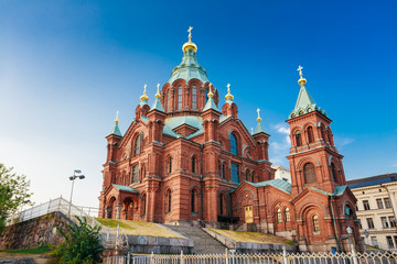 Fototapeta na wymiar Uspenski Cathedral, Helsinki On Hill At Sunny Day. Red Church In