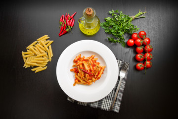 penne with arrabbiata sauce and fresh ingredients