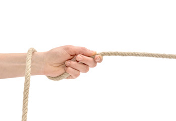 Hand pulling the rope. Isolated on white