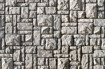 Texture of a wall built of granite stones