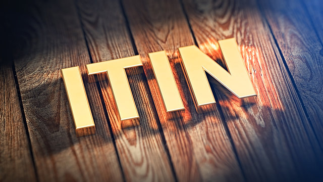 Acronym ITIN on wood planks