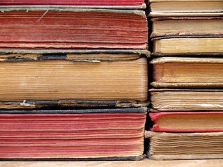 two mountains of ancient books
