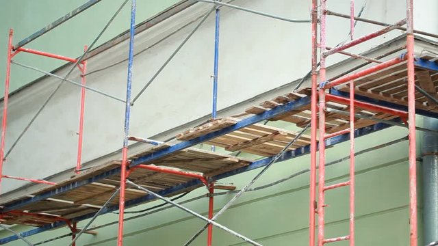 Scaffolding near the building wall during restoration