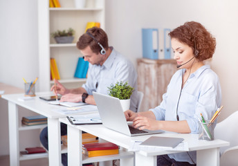 Fototapeta premium Concentrated colleagues working in the office 
