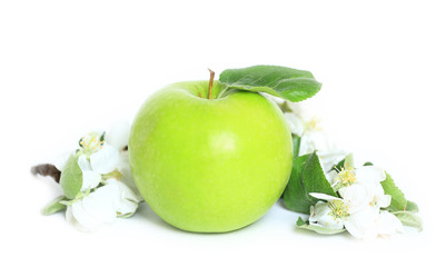 green apple with a leaf on a white background