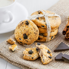 Chip cookies with chocolate. Biscuits and coffee for breakfast on a table.
