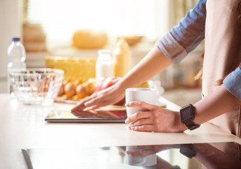 Pleasant woman  using tablet