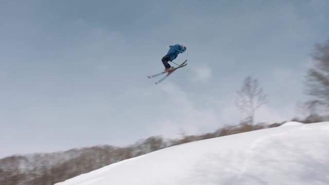 Skier Jumping Does a Double Backflip on a Jump