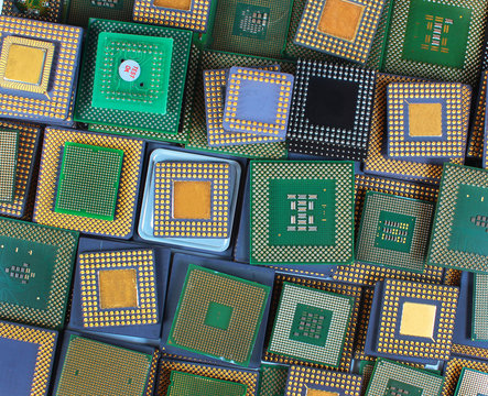 Many old CPU chips and obsolete computer processors as background
