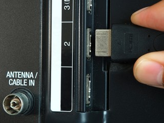 HDMI cable is connecting to TV HDMI input