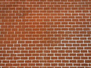 Fototapeta na wymiar Background of red brick wall pattern texture