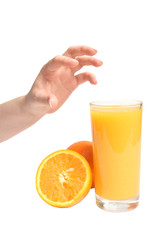 Human hand gesturing with fresh orange and full glass of orange juice taken on white background