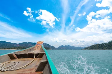 Foto op Canvas Boat travelling on a great lake in Thailand with speed, water splash © Urbanscape
