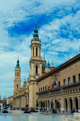 Fototapeta na wymiar Zaragoza, Spain - September 14, 2015: Zaragoza historical center. Our Lady of the Pillar Basilica and old city square.