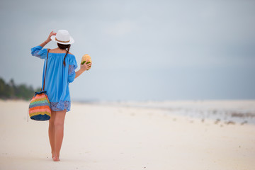 Young beautiful woman on beach vacation