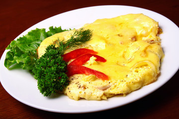 Meat baked with cheese