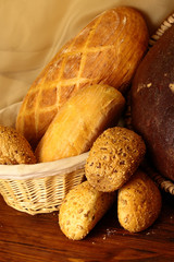 Buns with sesame seeds and different kinds of bread