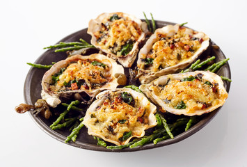 Oysters with Cheesy Gratin Topping Served on Plate