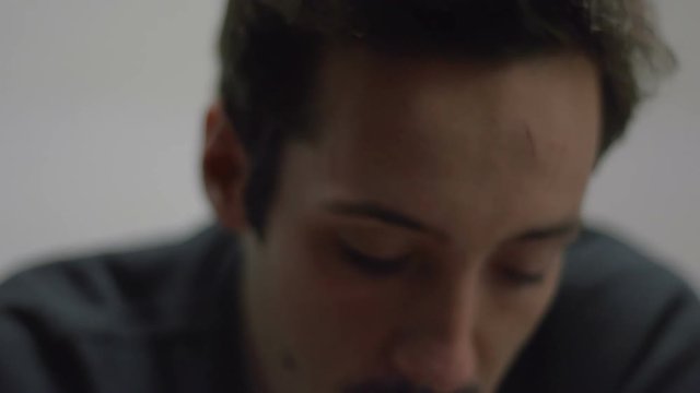 SUPER 35MM CAMERA - Man smoking a cigarette
