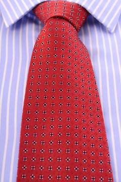 Red Mens Tie and Blue stripe shirt.