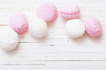 hite marshmallow - zephyr on a light wooden table