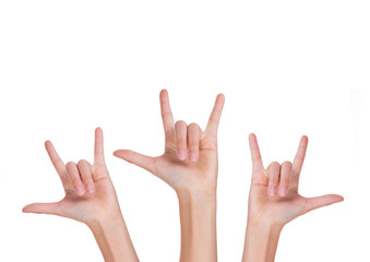 Three hands with fingers forming love sign