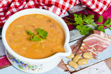 Traditional Polish cuisine:butter beans with tomatoes, bacon and marjoram (Breton beans)