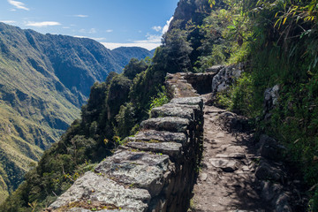 Fototapeta na wymiar Narrow Inca trail near Machu Picchu ruins, Peru.