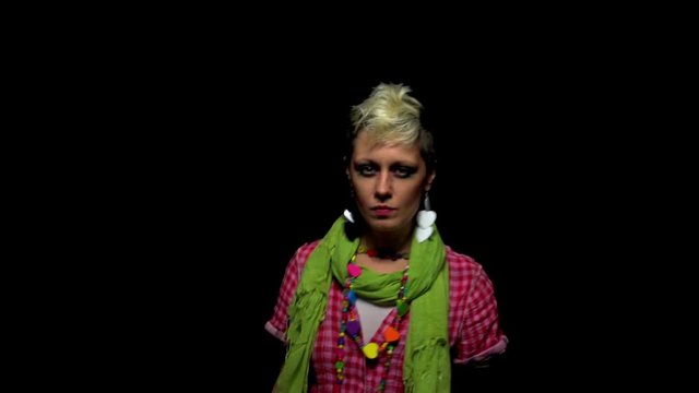 Woman with short and modern haircut dancing agressivbely 
