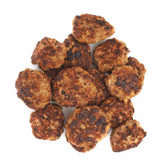 Pile of small hand made cutlets isolated over white background