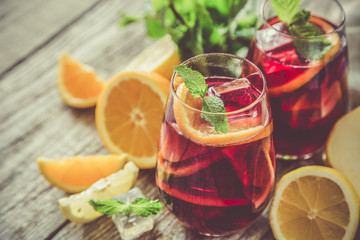 Sangria and ingredients in glasses - obrazy, fototapety, plakaty