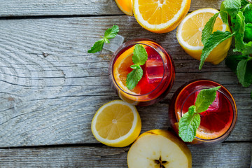 Sangria and ingredients in glasses