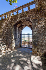 Porta do Sol Gate built into the medieval castle wall in Portas do Sol Garden. Santarem, Portugal.