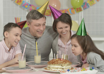 Happy family celebrating birthday