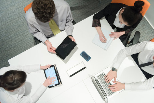 Aerial View Of Business People Group Brainstorming On Meeting