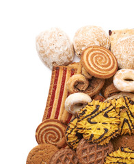 Pile of mix cookies isolated over the white background