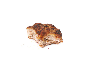 Bitten single small hand made cutlet isolated over white background