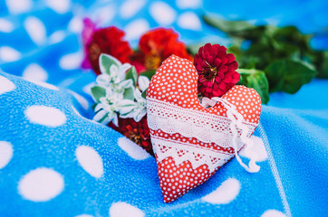 Valentine Day vintage rustic background. Red rag toy heart.