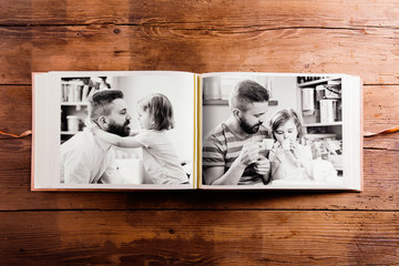 Fathers day composition. Photo album, black-and-white pictures.