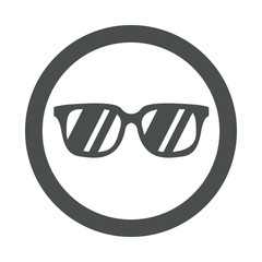 Icono plano gafas de sol en circulo color gris