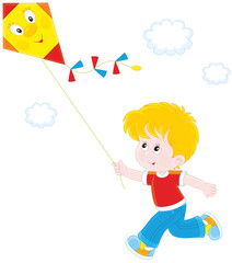 Little boy flying a kite