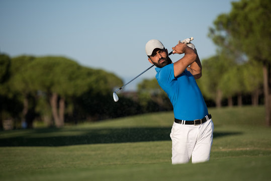 Pro Golfer Hitting A Sand Bunker Shot