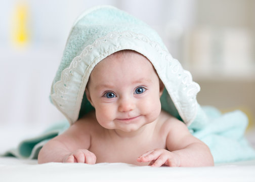 Adorable baby after shower or bathing