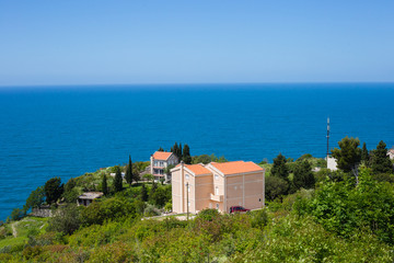 Fototapeta na wymiar Villa on a coast by the sea