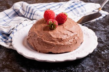Chocolate cake on a white plate