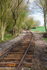 Fototapeta na wymiar Rail pour train à vapeur ancien dans la campagne