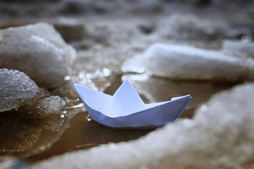 tinted photo paper boat on spring street