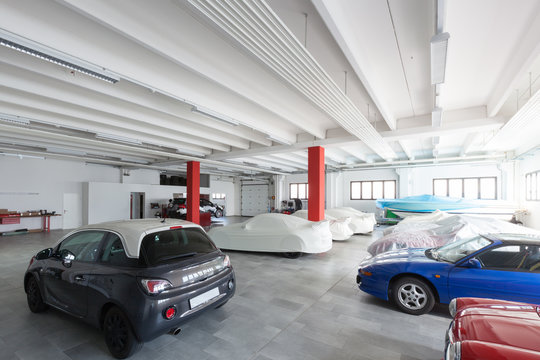 Modern garage interior, cars exposition