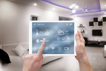Smart remote home control system app. Living room interior in background.