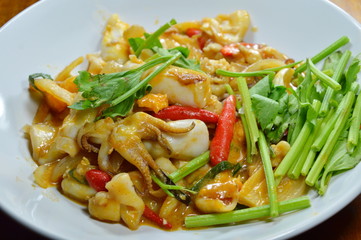 stir-fried squid with salt egg on dish